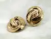 boucles d'oreilles clips dior vintage noeud tourbillon en métal doré