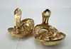 boucles d'oreilles clips dior vintage noeud tourbillon en métal doré