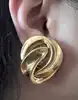 boucles d'oreilles clips dior vintage noeud tourbillon en métal doré