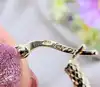 boucles d'oreilles créoles motifs martelés or 750 millième (18 ct) 1,14g