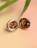 boucles d'oreilles labriola en clips chacune sertie d'une citrine facettée or 750 millième (18 ct) 11,60g