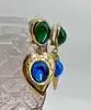 boucles d'oreilles pendantes clip vintage yves saint laurent motif coeurs verts, bleus et dorés