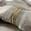 brac bracelet manchette ouvert tiges entrelacés