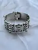bracelet à larges maillons rectangulaires et motifs géométriques argent 925 millième (22 ct) 46,58 g