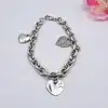 bracelet argent maille cable trois pendentifs coeurs orné d'oxydes l19,5cm argent 925 millième (22 ct) 23,26g