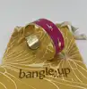 bracelet jonc large bangle up émail rose fuchsia et éclairs dorés