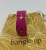 bracelet jonc large bangle up émail rose fuchsia et éclairs dorés