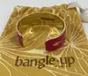 bracelet jonc large bangle up émail rose fuchsia et éclairs dorés