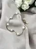 bracelet métal doré avec perles synthétique