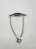 bracelet orné d'une pierre verte et de marcassites argent 925 millième (22 ct) 7,72g
