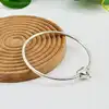bracelet pandora jonc fermoir cœur infini moments argent 925 millième (22 ct) 9,18g