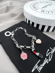 bracelet thomas sabo avec 3 charms ( rouge à lèvres, coeur, flacon de vernis à ongles ) argent 925 millième (22 ct) 16,46g