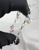 bracelet thomas sabo avec 3 charms ( rouge à lèvres, coeur, flacon de vernis à ongles ) argent 925 millième (22 ct) 16,46g