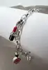 bracelet thomas sabo avec 3 charms ( rouge à lèvres, coeur, flacon de vernis à ongles ) argent 925 millième (22 ct) 16,46g