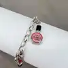 bracelet thomas sabo avec 3 charms ( rouge à lèvres, coeur, flacon de vernis à ongles ) argent 925 millième (22 ct) 16,46g