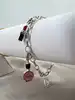 bracelet thomas sabo avec 3 charms ( rouge à lèvres, coeur, flacon de vernis à ongles ) argent 925 millième (22 ct) 16,46g