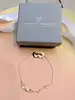 bracelet vanessa tugendhaft masque vénicien serti d'un petit diamant or 750 millième (18 ct) 3,15g