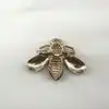 broche en émail motif abeille ornée d'oxydes