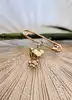 broche épingle avec un charm ourson or 750 millième (18 ct) 1,33g