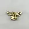 broche motif abeille pavée d'oxydes