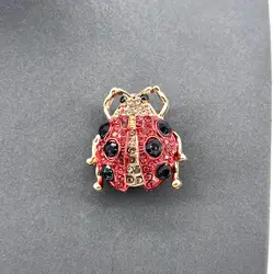 broche motif coccinelle pavée d'oxydes