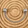 charm pandora chaîne de sécurité fleur de marguerite  argent 925 millième (22 ct) 3,39g