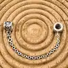 charm pandora chaîne de sécurité fleur de marguerite  argent 925 millième (22 ct) 3,39g