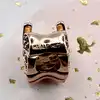 charm pandora feuille pavé scintillant en or rose avec cristaux dégrades rose et violet