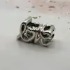 charm pandora love manuscrit  argent 925 millième (22 ct) 1,87g