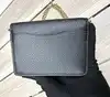coach mini sac en cuir grainé noir avec chaîne dorée amovible