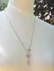 collier apm monaco triple météorites serti d'oxydes de zirconium argent 925 millième (22 ct) 6,82g