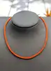 collier avec cordon en soie orange or 750 millième (18 ct) 2,28g