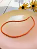 collier avec cordon en soie orange or 750 millième (18 ct) 2,28g