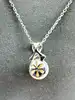collier en argent avec pendentif en forme de noeud serti d'oxydes retenant une perle ronde argent 925 millième (22 ct) 2,92g