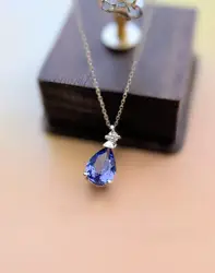 collier en or blanc avec pendentif tanzanite surmontée d'un diamant or 750 millième (18 ct) 2,63g