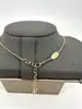 collier louis vuitton essential v en laiton à finition dorée