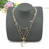 collier multi-rangs aux mailles variées en métal doré