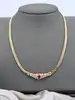 collier or centré un motif en 2 ors orné d'un rubis et de petits diamants or 750 millième (18 ct) 13,21g