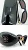 lunettes de soleil chanel 5127-b camélia strass monture noire et verres marron