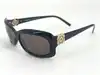 lunettes de soleil chanel 5127-b camélia strass monture noire et verres marron