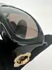 lunettes de soleil chanel 5127-b camélia strass monture noire et verres marron