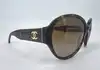 lunettes de soleil chanel 5229q écaille branches cuir & logo cc verres polarizés