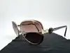 lunettes de soleil chanel camélia 4187 c.395/3b monture en métal doré et acétate écaille, verres marron dégradé