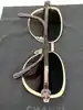 lunettes de soleil chanel camélia 4187 c.395/3b monture en métal doré et acétate écaille, verres marron dégradé