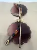 lunettes de soleil chloé rosie ce142s monture dorée et verres violet dégradé