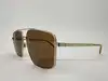 lunettes de soleil gucci gg0941s-003 en métal doré et verres marrons