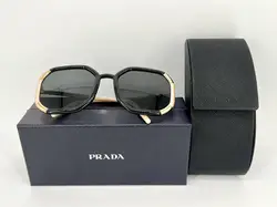 lunettes de soleil prada spr20x avec des verres noirs