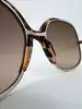 lunettes de soleil vanessa bruno zippy 01 écaille marron et métal doré