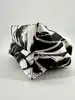 mini sac à main vintage emilio pucci en soie noir et blanc
