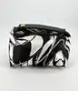 mini sac à main vintage emilio pucci en soie noir et blanc